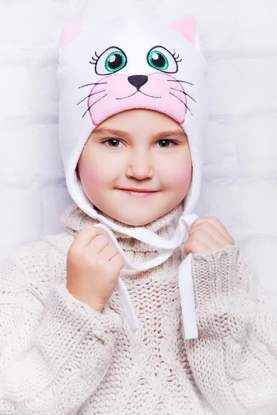 Smiling girl in warm hat — Stock Photo, Image