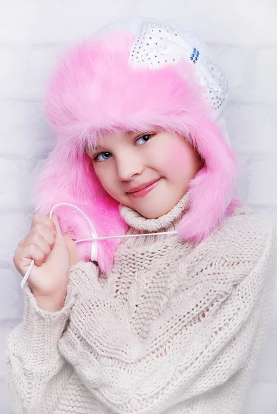 Smiling girl in warm winter hat — Stock Photo, Image