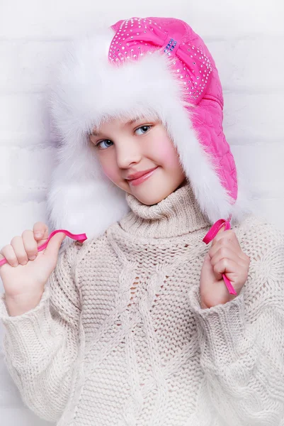 Smiling girl in warm winter hat — Stock Photo, Image