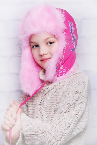 Smiling girl in warm winter hat — Stock Photo, Image