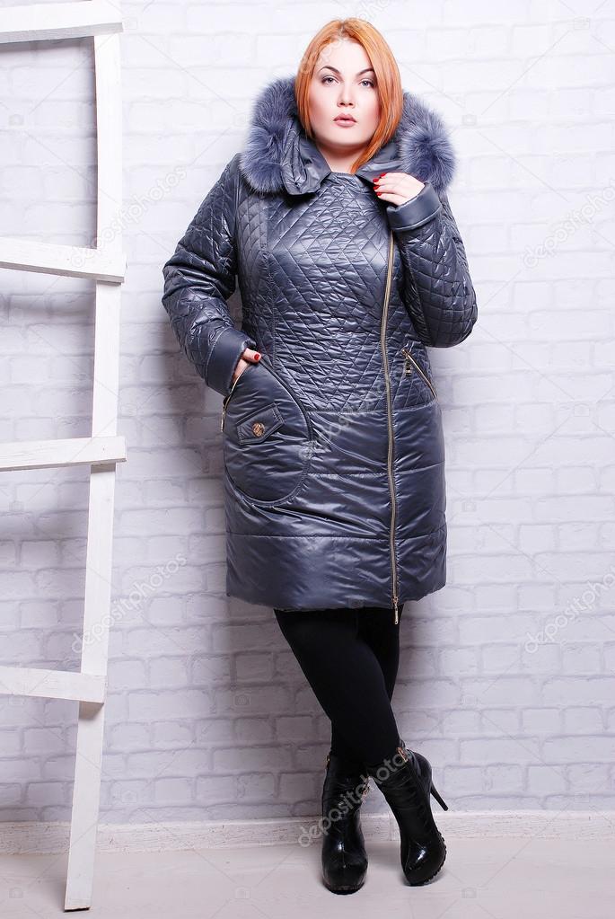 Woman in winter trendy coat