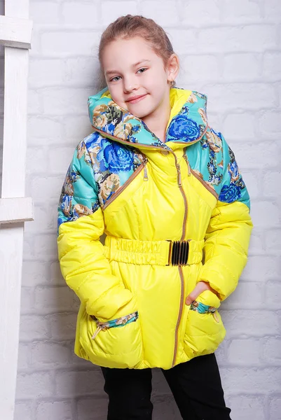 Little girl in autumn warm coat — Stock Photo, Image