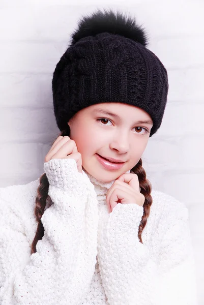 Smiling girl wearing warm hat — Stock Photo, Image