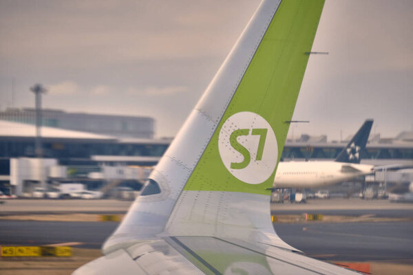 Narita, Japan - Feb 03, 2020: the area of the Narita airport in Tokyo. Plane Parking at Narita airport. an AIRBUS A320NEO aircraft with the tail number VQ-BGT of SIBERIA AIRLINES is being prepared for a flight to Khabarovsk, Russia. Narita internatio