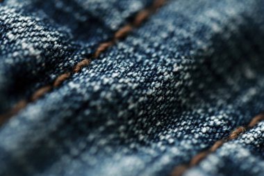 Kot pantolon deseni yakın, sadece bir noktaya odaklan, yumuşak mavi arka plan duvar kağıdı