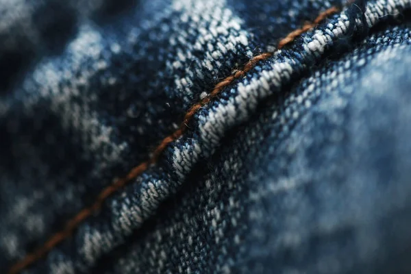 Jeans denim texture close up , focus only one point , soft blured ...