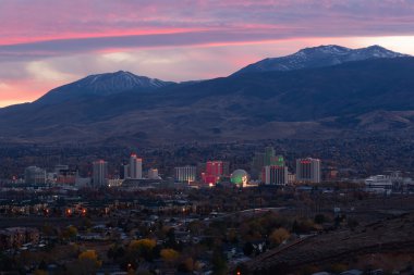 Reno Nevada Gambling City Evening Sunset Skyline Sunflower Mountains clipart