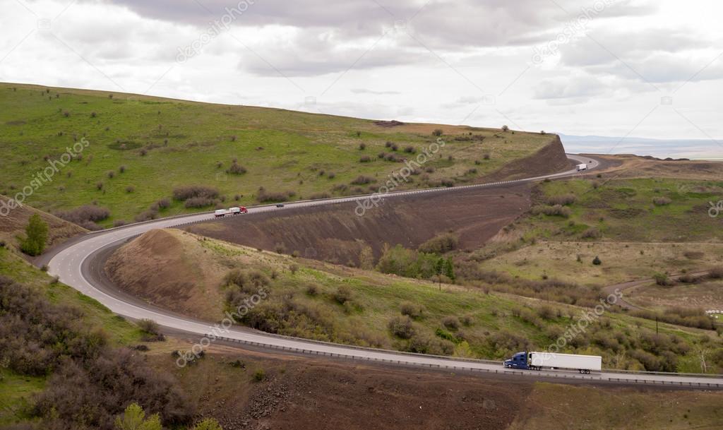 Open Road Semi Trucks Travel Curved Highway Oregon Countryside