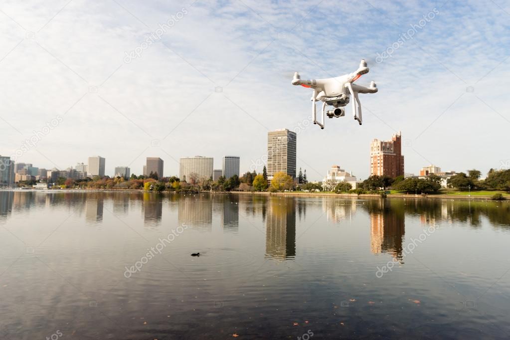 A dDrone Quadcopter Hoovers over Lake Merritt Oakland California