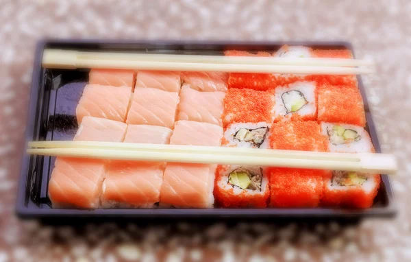 Rollos y sushi —  Fotos de Stock