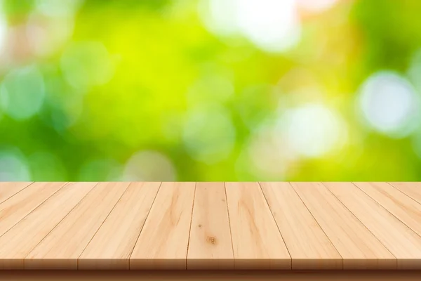 Naturaleza abstracta fondo borroso con bokeh y suelo de madera — Foto de Stock