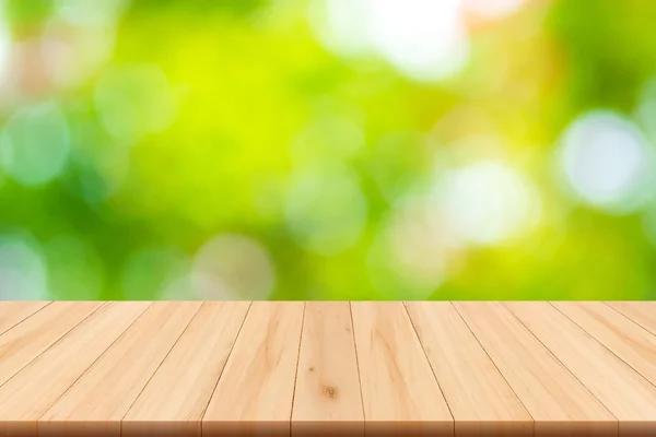 Abstract nature blurred background with bokeh and wooden floor — Stock Photo, Image