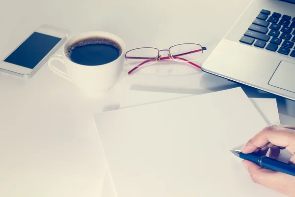 Businessman working on  table with laptop and coffee cup Stock Picture