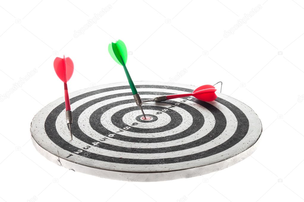 dart arrow hitting in the target center of dartboard,abstract of success