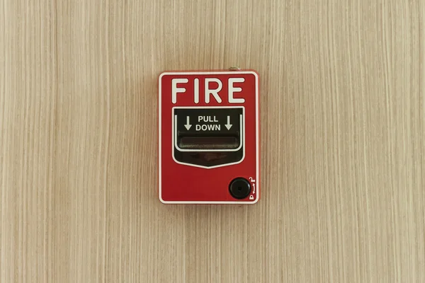 Fire alarm on wood wall