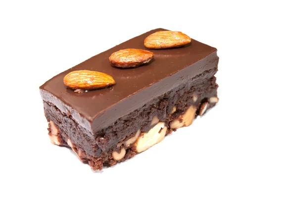 Sweet chocolate cake and almond nut — Stock Photo, Image