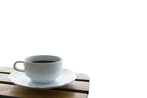 Kaffeetasse auf Holztisch — Stockfoto