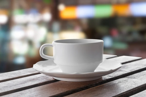 Coffee cup in coffee shop — Stock Photo, Image