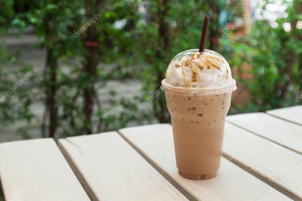 Premium Photo, Iced coffee in plastic cup