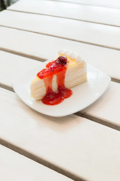 Crepe cake with strawberry sauce — Stock Photo, Image