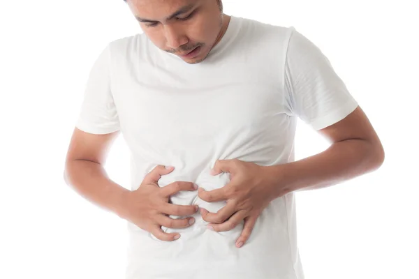 Asian man in white t-shirt suffering from stomachache — Stock Photo, Image