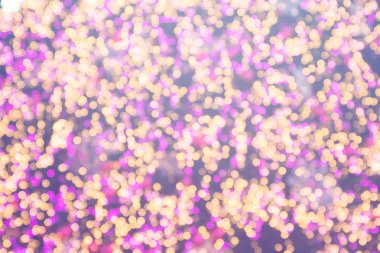 Festival bulanıklık arka plan. Soyut bokeh defocused altın ve pur