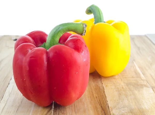 Paprika op houten — Stockfoto