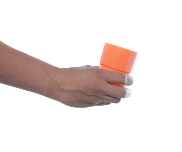 Hand holding plastic cup — Stock Photo, Image