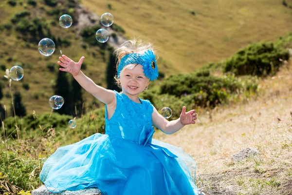 Little child girl with bubble blower — Stock Photo, Image