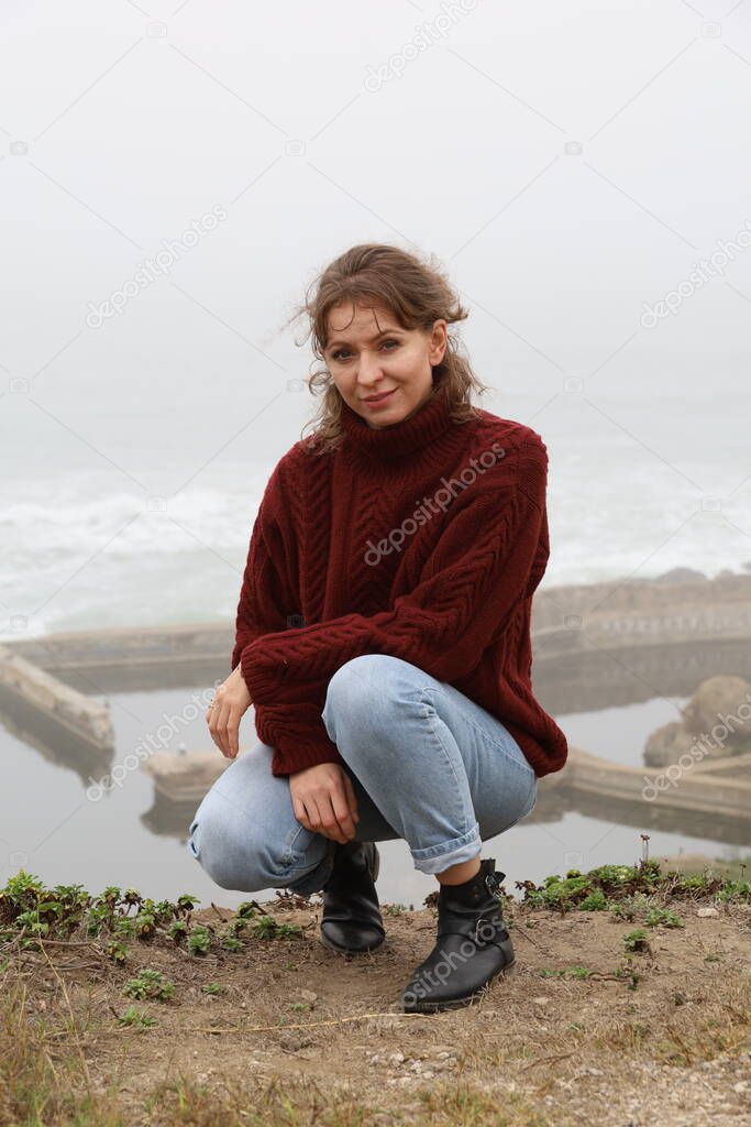 Photoshoot of a beautiful Russian model in a park