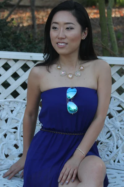 Pretty Chinese  girl in a blue dress — Stock Photo, Image