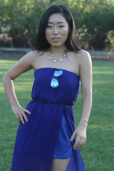 Pretty Chinese  girl in a blue dress — Stock Photo, Image