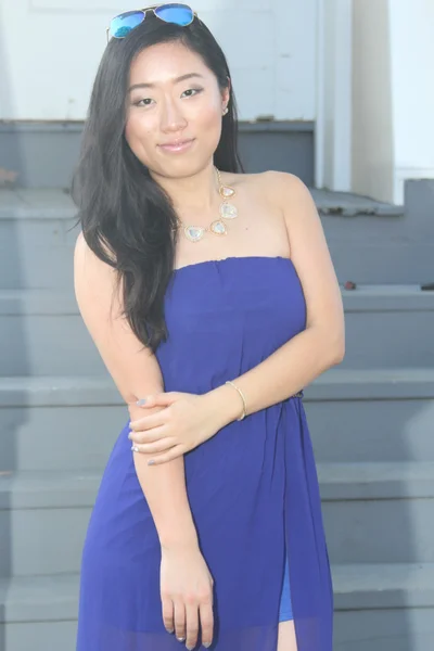 Pretty Chinese  girl in a blue dress — Stock Photo, Image