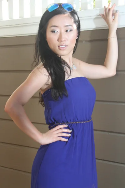 Pretty Chinese  girl in a blue dress — Stock Photo, Image