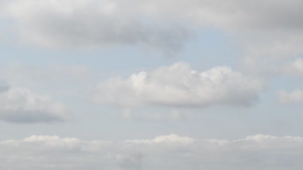 Cloudscape time lapse of gray white clouds float in blue sky — Stock Video