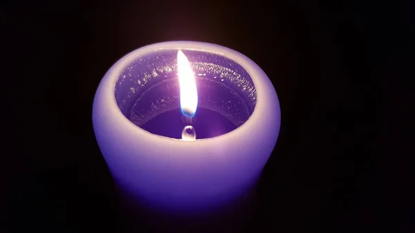 Candlelight Flame Closeup Black Background Burning Fire Purple Candle Darkness — Stock Photo, Image