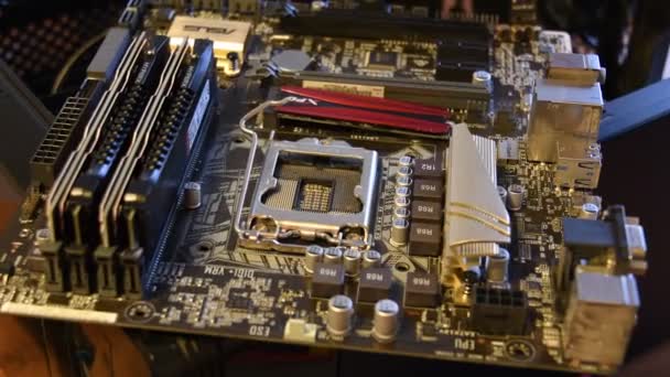 Closeup of motherboard hardware with empty space for CPU — Stock Video