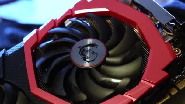 Closeup MSI GeForce GTX 1080 Gaming X 8G graphics card with rotating fan cooler — Stock Video