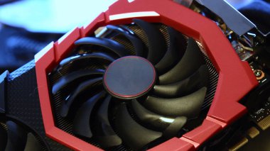 Closeup gaming graphics card with black fan cooler