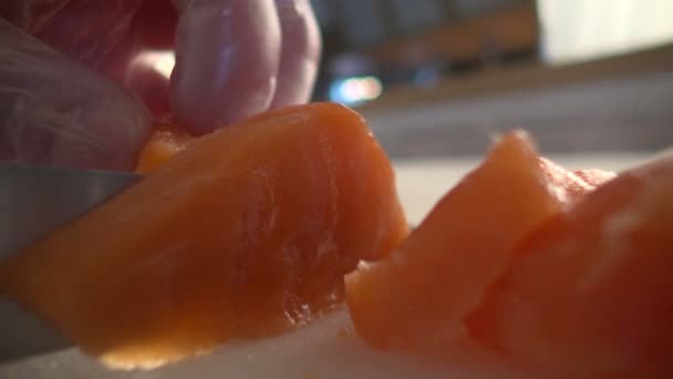 Chef slices salmon fillets — Stock Footage Chef slices salmon fillets Stock Video