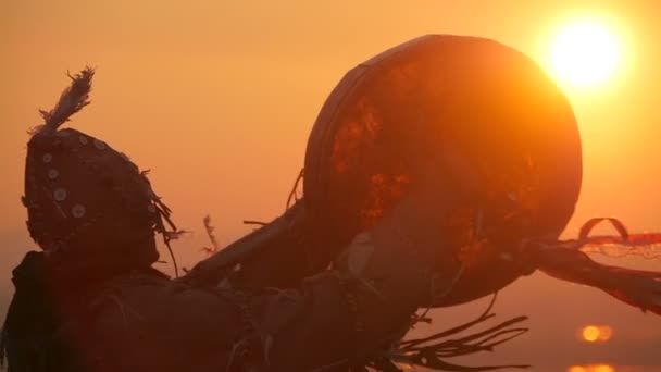 Khakas shaman  performs ritual at sunrise Stock Video