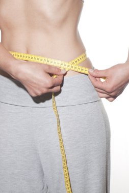 Yakın kadar onu kalça ölçme kadın
