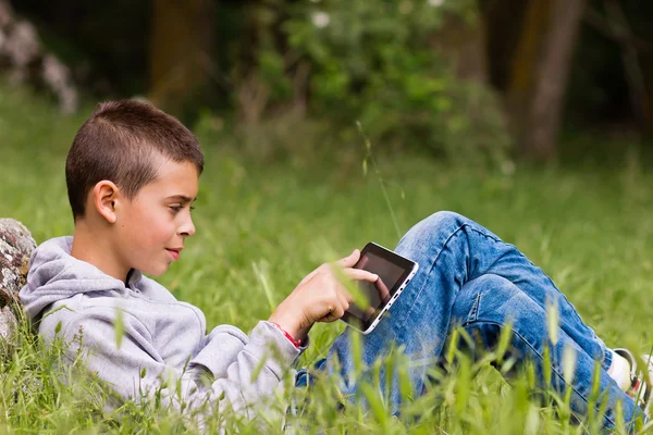 Child with tablet Stock Image