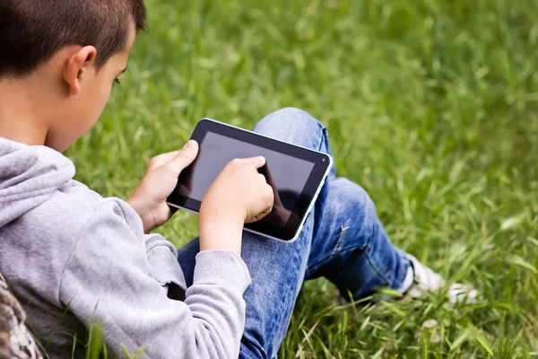 Child with tablet Stock Picture