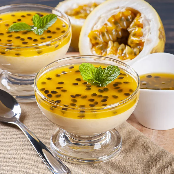 Passion fruit mousse. Refreshing dessert with fresh passion fruit topping