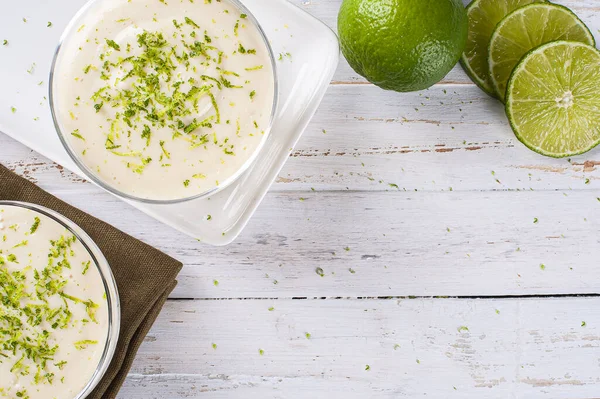 Delicious lemon mousse. Refreshing and tasty dessert - Lime mousse. Top view. Copy space