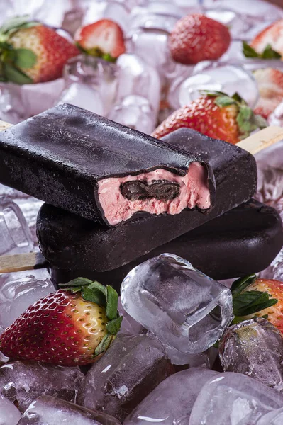 Strawberry ice cream with chocolate coating. Strawberry Popsicle.