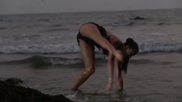 Girl dancing in sea — Stock Video