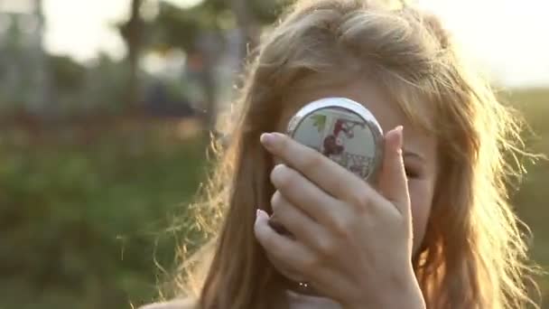 Girl looking in mirror — Stock Video