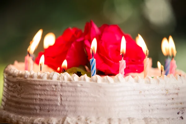 Delicious cake with candles — Stock Photo, Image